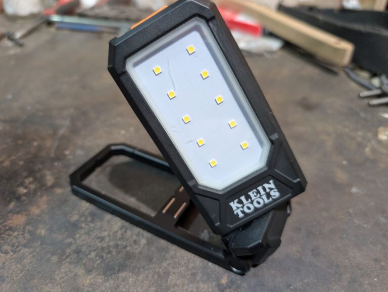 Klein slim work light with pivoting head turned for tight-access lighting