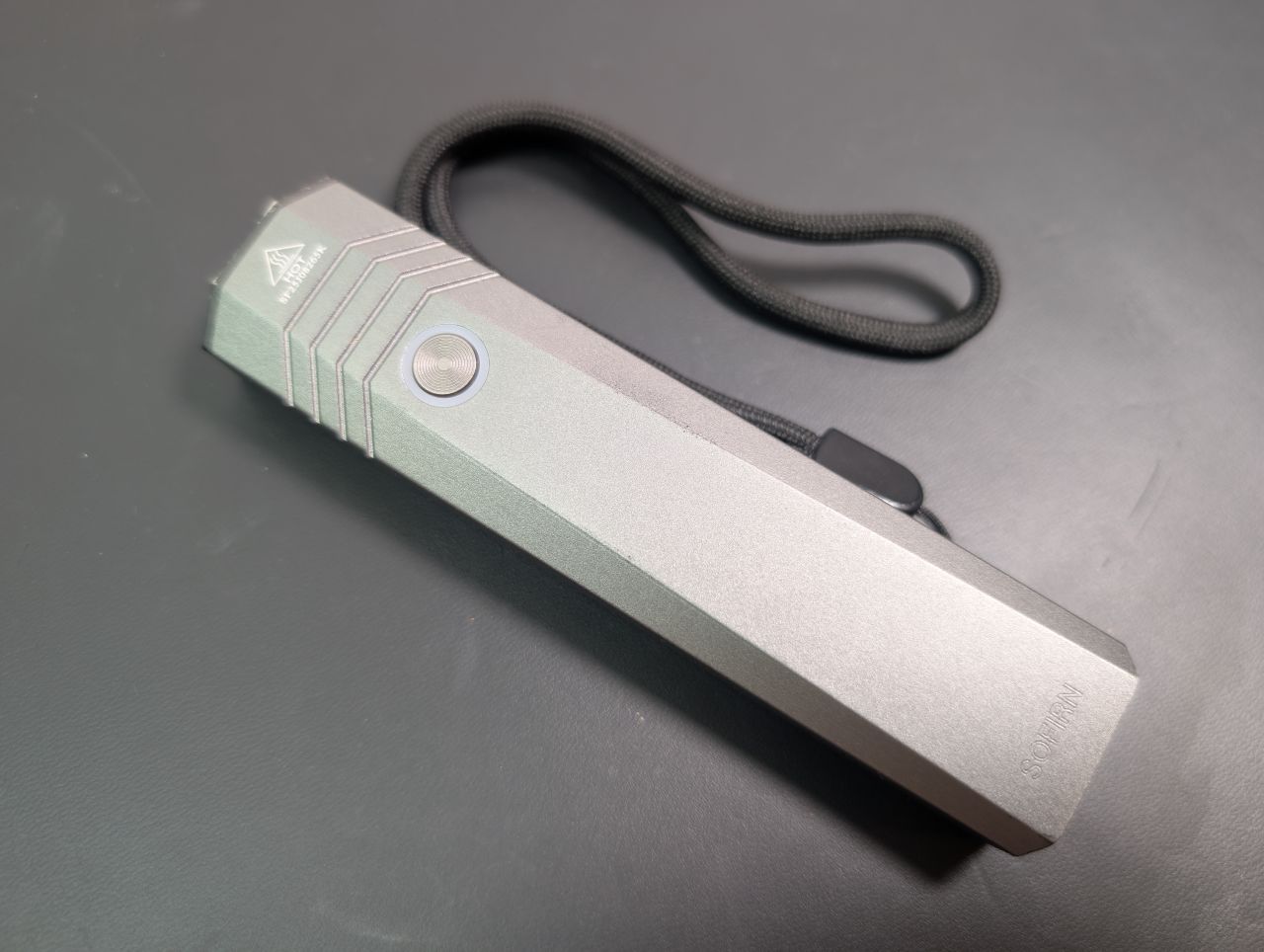 Sofirn ST1 flat EDC flashlight, front view