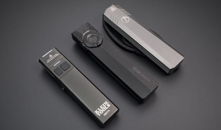 Klein 56074, Olight ArkPro Ultra, and Sofirn ST1 flat EDC flashlights side by side