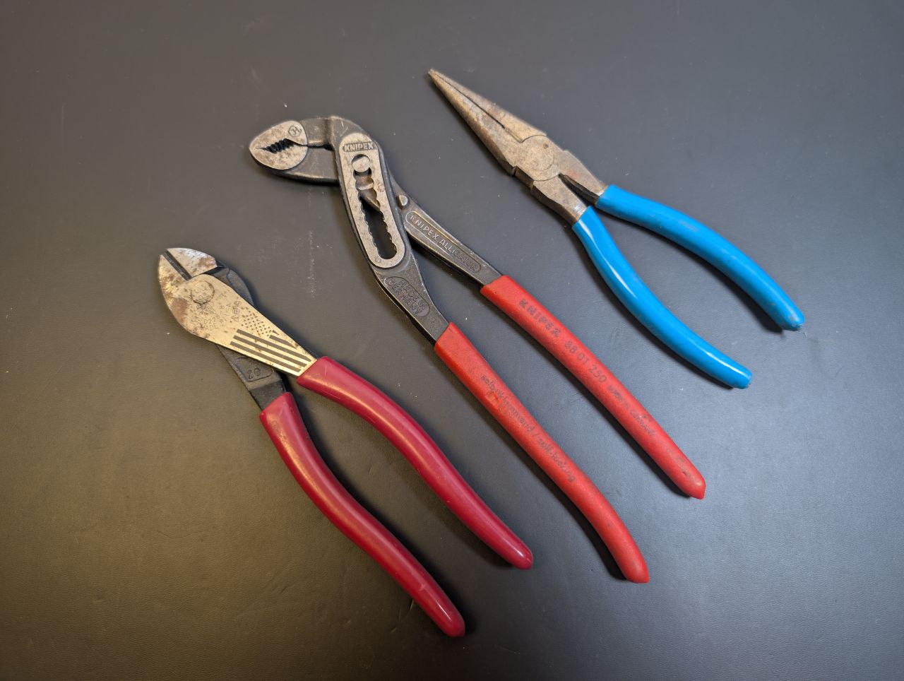 Linesman pliers, Knipex Cobra pliers, and needle-nose pliers