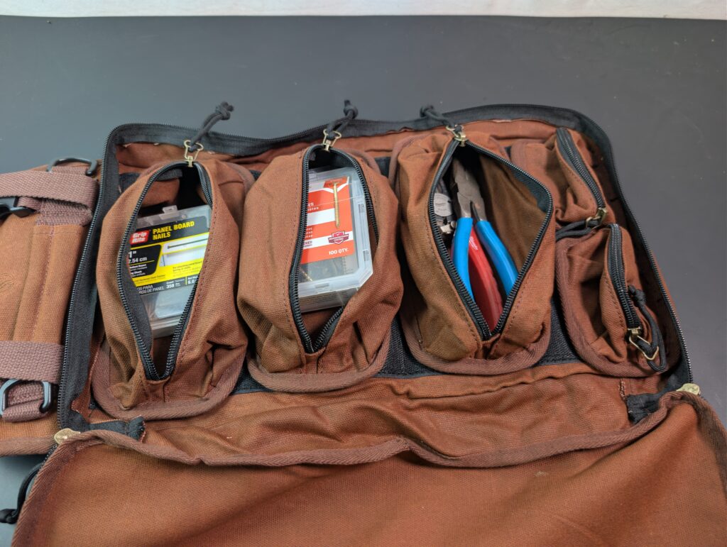 The five removable zippered pouches for the Roaring Fire Pack Mule Mini tool roll