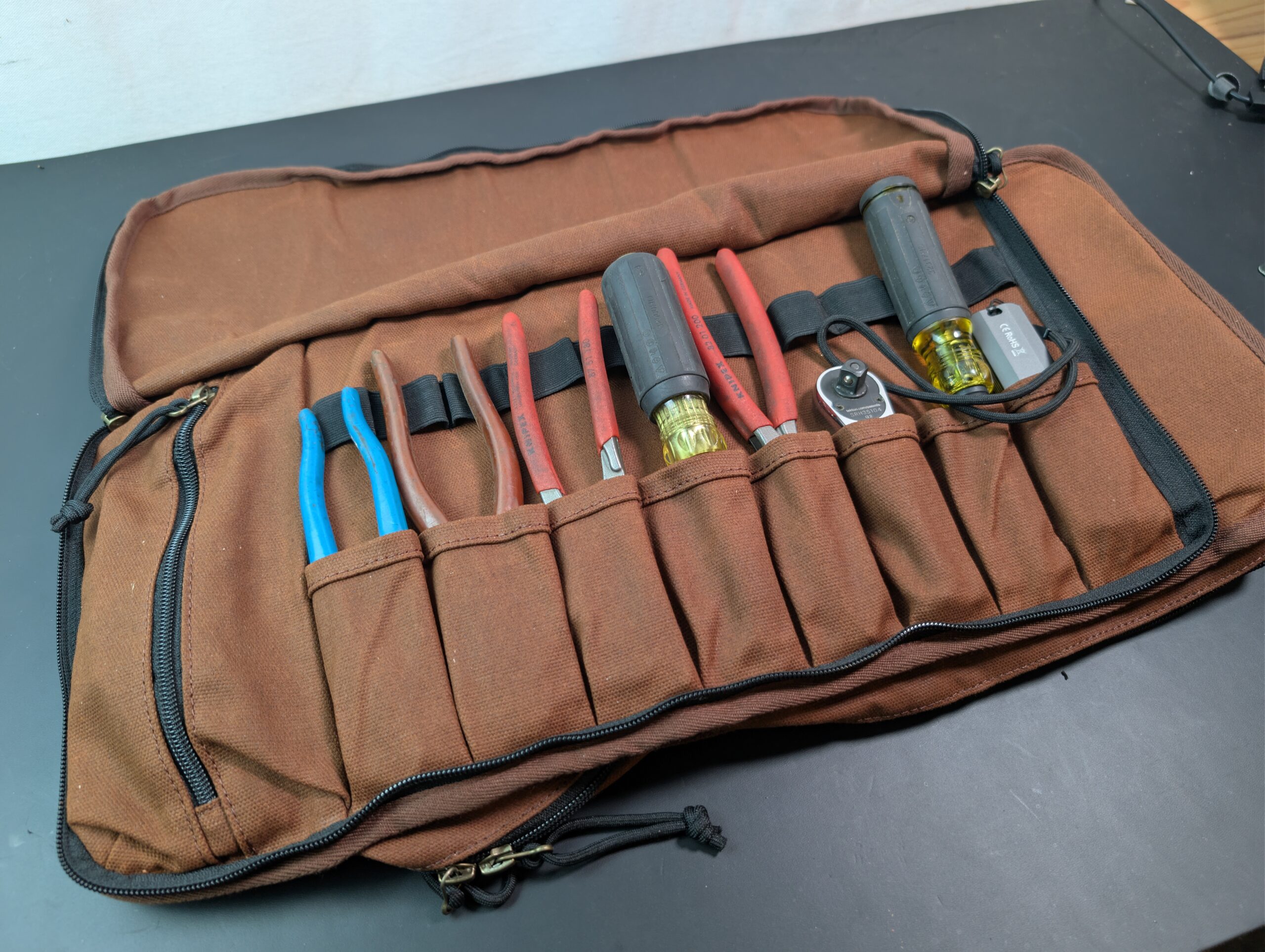 Eight tool pockets on the other side of the Pack Mule Mini tool roll